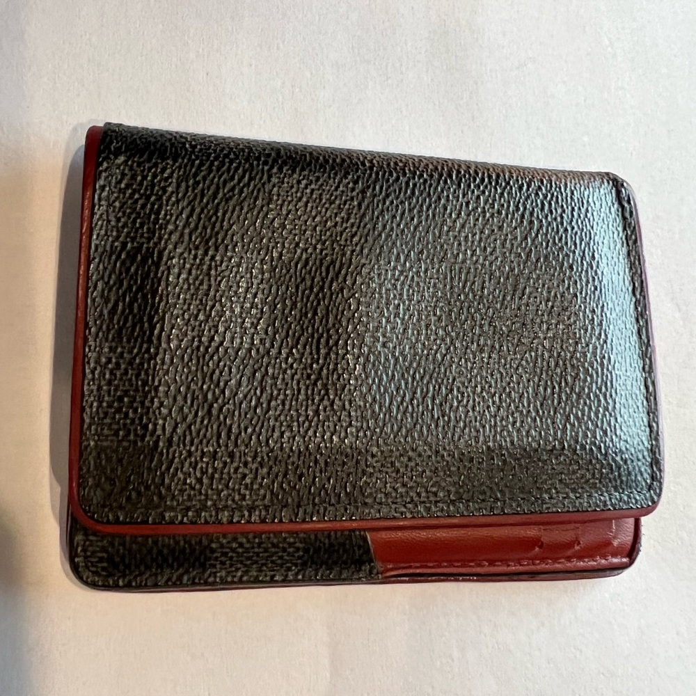 Lv wallet black and gray with red accents